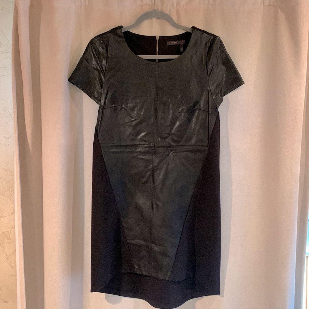 Black short sleeve mini dress, faux leather in front, zipper in back